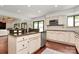 Kitchen island with granite countertops, ample cabinetry, and stainless steel appliances at 9423 Man O War Rd, Fort Mill, SC 29707