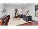 Inviting living room featuring stylish seating, a cozy rug, and ample natural light at 9423 Man O War Rd, Fort Mill, SC 29707