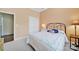 Comfortable bedroom features neutral walls, a bed with decorative pillows, and a closet at 964 Knob Creek Ln, Fort Mill, SC 29708