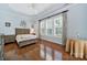 Comfortable main bedroom with hardwood floors, plantation shutters, and decorative accents at 964 Knob Creek Ln, Fort Mill, SC 29708