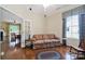 Comfortable sitting room with hardwood floors and a view into the main living areas at 964 Knob Creek Ln, Fort Mill, SC 29708