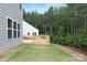 Spacious backyard featuring a newly constructed deck and a lush green lawn at 9858 Jack Nicklaus Dr # 897, Lancaster, SC 29720