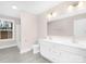 Bathroom with a double sink vanity, tile floors, and natural light at 9858 Jack Nicklaus Dr # 897, Lancaster, SC 29720