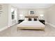 Serene bedroom with a large bed, side tables, and stylish decor at 9858 Jack Nicklaus Dr # 897, Lancaster, SC 29720