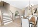 Bright dining area with a modern chandelier, stylish decor, and staircase at 9858 Jack Nicklaus Dr # 897, Lancaster, SC 29720