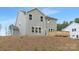 Rear exterior view of a two story home featuring neutral siding and a wood deck at 9858 Jack Nicklaus Dr # 897, Lancaster, SC 29720