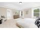 Spacious main bedroom with ample natural light and a seating area at 9858 Jack Nicklaus Dr # 897, Lancaster, SC 29720