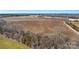 An aerial view of land for sale featuring a road and surrounding trees at 0000 Milling Rd, Rock Hill, SC 29730