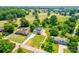 Aerial shot showcasing home, surrounded by lush greenery in a neighborhood close to a golf course at 102 Starmount Dr, Kings Mountain, NC 28086