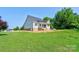Picture of the house's backyard featuring fresh green grass and ample space at 102 Starmount Dr, Kings Mountain, NC 28086