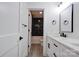 Bright bathroom with white vanity, marble countertop and black hardware at 102 Starmount Dr, Kings Mountain, NC 28086