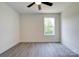 Bright bedroom with a ceiling fan and a window that provides ample natural light at 102 Starmount Dr, Kings Mountain, NC 28086