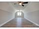 Spacious bonus room with angled ceilings and large window providing natural light at 102 Starmount Dr, Kings Mountain, NC 28086