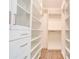 Custom walk-in closet with drawers, shelves, and hanging rods at 102 Starmount Dr, Kings Mountain, NC 28086