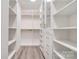 Walk-in closet with custom shelving and drawer system at 102 Starmount Dr, Kings Mountain, NC 28086