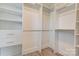 Organized walk-in closet with shelves, drawers and hanging rods at 102 Starmount Dr, Kings Mountain, NC 28086
