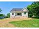 Charming home featuring neutral siding, a dark roof, and an inviting entrance at 102 Starmount Dr, Kings Mountain, NC 28086