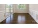 Light-filled dining room boasting elegant molding and gleaming hardwood floors at 103 Margo Ln, Statesville, NC 28677
