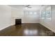 Bright living room features a fireplace, hardwood floors, and lots of natural light at 103 Margo Ln, Statesville, NC 28677
