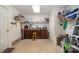 Unfinished basement featuring storage cabinets, shelving, and a stool with ample space for projects at 111 Trails End Ln, New London, NC 28127