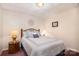 A comfortable bedroom with a full bed, bedside lamps, and a simple design for a relaxing atmosphere at 111 Trails End Ln, New London, NC 28127