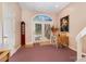 A home entryway featuring a French door, a stairway, and a small dining table with two chairs at 111 Trails End Ln, New London, NC 28127