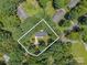 Aerial view of a home site surrounded by lush, mature trees offering ample privacy at 1123 Timberlane Dr, Lincolnton, NC 28092
