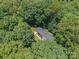 This home is nestled in a secluded setting, encircled by verdant trees and providing a private retreat from the world at 1123 Timberlane Dr, Lincolnton, NC 28092