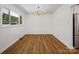 Spacious dining room with hardwood floors and elegant chandelier at 1123 Timberlane Dr, Lincolnton, NC 28092