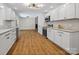 Stylish kitchen with white cabinetry, stainless steel appliances, and an open layout for easy entertaining at 1123 Timberlane Dr, Lincolnton, NC 28092