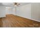 Spacious living room featuring hardwood floors, neutral paint, and a modern ceiling fan at 1123 Timberlane Dr, Lincolnton, NC 28092