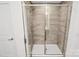 Modern tiled shower features glass door, sleek fixtures, and fresh paint at 13022 Rover St, Charlotte, NC 28273