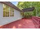 Exterior view of the home with a large back deck at 131 Canopy Ct, Mooresville, NC 28115