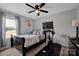 Comfortable bedroom with modern furniture and natural light at 1315 Elizabeth Ave, Kannapolis, NC 28083