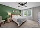 Spacious main bedroom with a king-size bed and large windows at 1315 Elizabeth Ave, Kannapolis, NC 28083