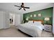 Bedroom with neutral tones, a cozy bed, and a serene ambiance at 1315 Elizabeth Ave, Kannapolis, NC 28083