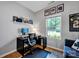 Bright office with a modern desk setup, and view of the outdoors at 1315 Elizabeth Ave, Kannapolis, NC 28083