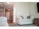 Inviting living room with neutral walls, wood floor, plush seating, and ample natural light at 14411 Glendon Hall Ln, Charlotte, NC 28262