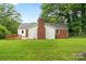 Backyard of house with green grass and deck at 1512 Anthony Dr, Gastonia, NC 28052