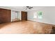 Bright living room with brick accents and open doorway at 1512 Anthony Dr, Gastonia, NC 28052