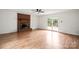 Spacious living room featuring a brick fireplace and French doors at 1512 Anthony Dr, Gastonia, NC 28052