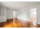 Spacious living area featuring gleaming hardwood floors and abundant natural light at 1512 Anthony Dr, Gastonia, NC 28052