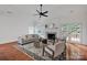 Spacious living room boasts natural light, a fireplace, and comfortable seating at 16013 Wynfield Creek Pkwy, Huntersville, NC 28078