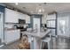 Kitchen island with granite countertops and stainless steel appliances at 17438 Purser Dr, Locust, NC 28097