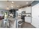 Kitchen with island, granite countertops, stainless appliances, and seating for two at 17438 Purser Dr, Locust, NC 28097
