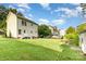 Spacious backyard with lush green grass and a well-maintained lawn perfect for outdoor activities at 1912 Baxter St, Charlotte, NC 28204