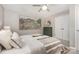 Bedroom with carpet, ceiling fan, and window bringing in natural light at 1912 Baxter St, Charlotte, NC 28204