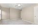 Bright, neutrally decorated bedroom featuring multiple windows and doors at 1912 Baxter St, Charlotte, NC 28204