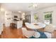 Bright kitchen featuring a white island, bar seating and stainless steel appliances at 1912 Baxter St, Charlotte, NC 28204
