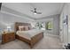 Comfortable bedroom with a large bed, side tables, and neutral decor at 19506 Mary Ardrey Cir, Cornelius, NC 28031